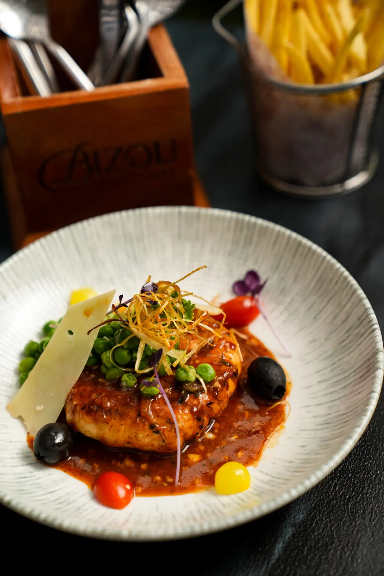 Cajun chicken steak served in bizou café & grill, alagesan road, saibaba colony, coimbatore